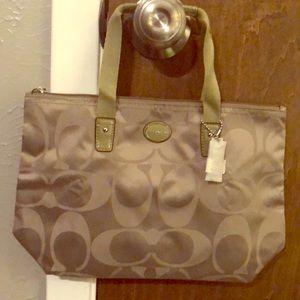 Coach caring tote with makeup bag! 👜